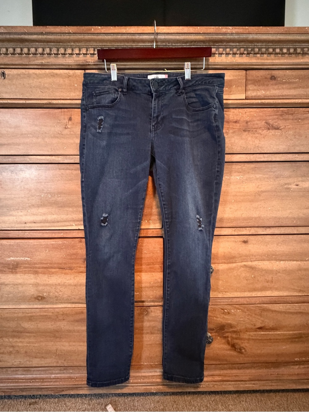 CAbi Women's Dark Wash Skinny Jeans with Light Distressing